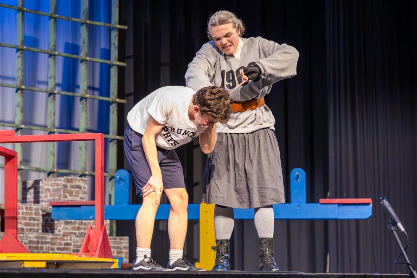 Students perform onstage